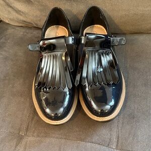 Clarks Shiny Black Loafers with Fringe